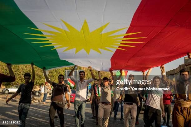 Kurdish people show their support for the upcoming referendum for independence of Kurdistan in a gathering at City Centre on September 13, 2017 in...