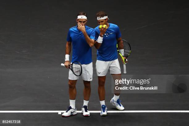 Roger Federer and Rafael Nadal of Team Europe react during there doubles match against Jack Sock and Sam Querrey of Team World on Day 2 of the Laver...