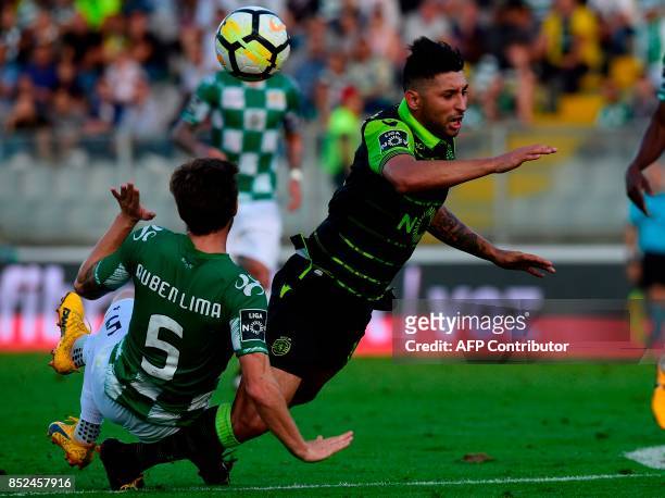 Moreirense's defender Ruben Lima vies with Sporting's Argentinian forward Alan Ruizduring the Portuguese league football match Moreirense FC vs...