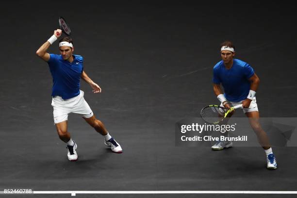 Roger Federer and Rafael Nadal of Team Europe in action during there doubles match against Jack Sock and Sam Querrey of Team World on Day 2 of the...