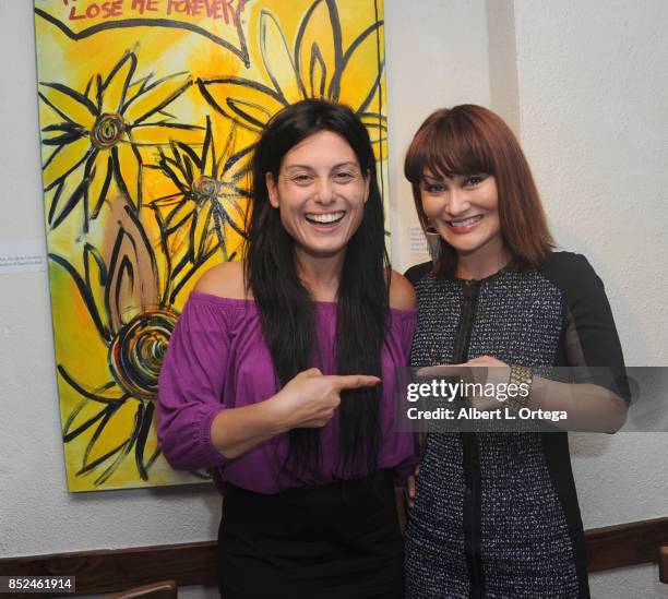 Actresses Alexis Iacono and Mary Christina Brown attend the Vanessa E. Garcia's Art Show with partial proceeds going to House of Ruth based in East...