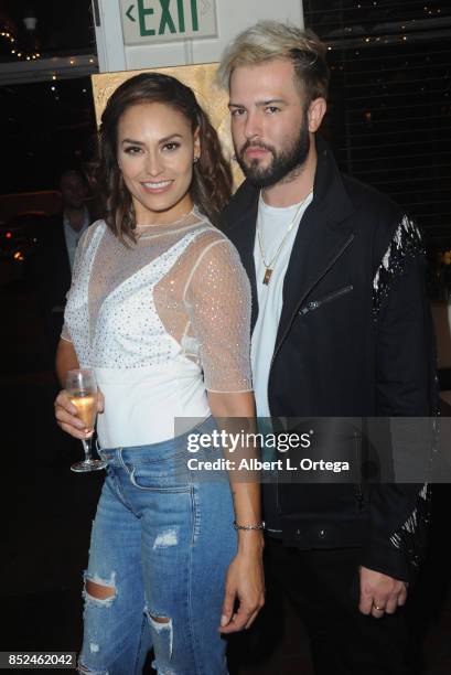 Actress Jes Meza and blogger Ben Press attend the Vanessa E. Garcia's Art Show with partial proceeds going to House of Ruth based in East Los Angeles...