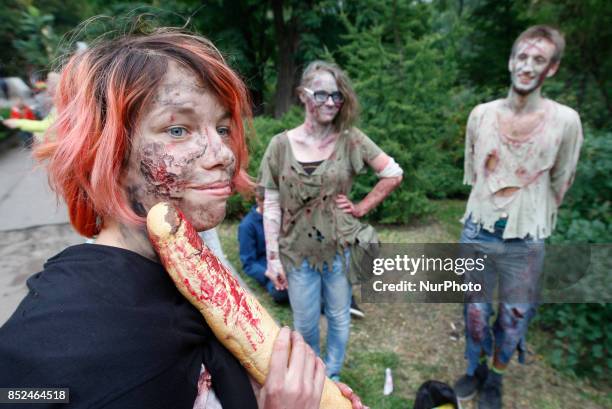 Ukrainians dressed up as zombies take part in a &quot;Zombie walk&quot; in downtown Kiev,Ukraine, 23 September,2017.