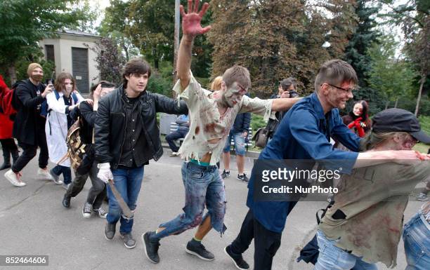 Ukrainians dressed up as zombies take part in a &quot;Zombie walk&quot; in downtown Kiev,Ukraine, 23 September,2017.