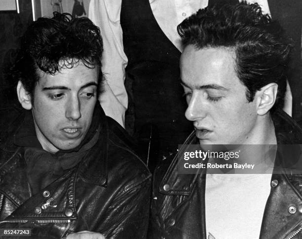 Photo of CLASH and Joe STRUMMER and Mick JONES; L-R. Mick Jones, Joe Strummer - posed, during first US tour