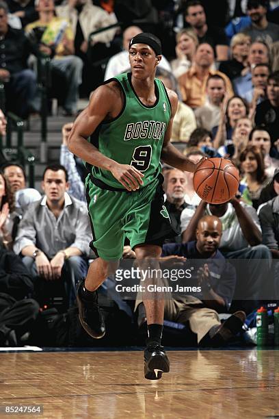 Rajon Rondo of the Boston Celtics moves the ball up court during the game against the Dallas Mavericks at American Airlines Center on February 12,...