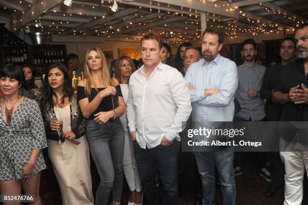 Santana Dempsey, Melinna Bobadilla, Carrie Lawrence, David Guillod and Bryan Brucks attend actress/artist Vanessa E. Garcia's Art Show with partial...