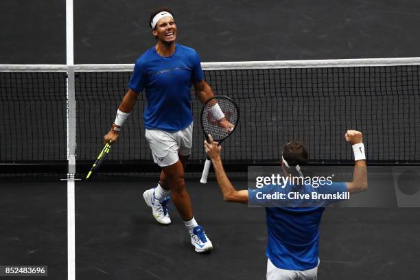 Roger Federer and Rafael Nadal of Team Europe celebrate winning match point during there doubles match against Jack Sock and Sam Querrey of Team...