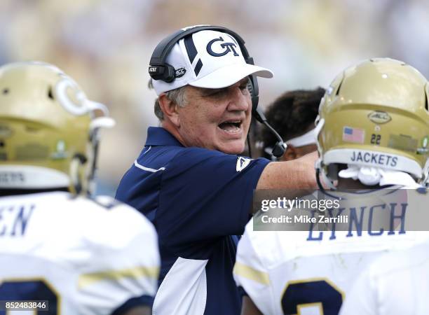 Georgia Tech Yellow Jackets head coach Paul Johnson directs his players during a timeout during the game against the Pittsburgh Panthers at Bobby...