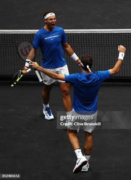 Roger Federer and Rafael Nadal of Team Europe celebrate winning match point during there doubles match against Jack Sock and Sam Querrey of Team...