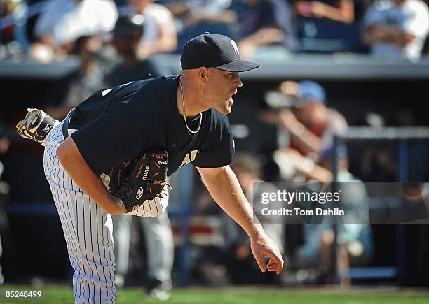 Michael Dunn of the New York Yankees delivers a pitch during a Grapefruit League Spring Training Game against the Minnesota Twins at George M....