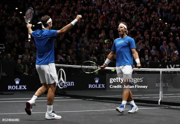Roger Federer and Rafael Nadal of Team Europe celebrate winning match point during there doubles match against Jack Sock and Sam Querrey of Team...