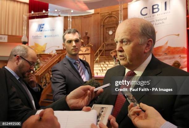 The Republic's Finance Minister Michael Noonan, speaking to the media, before giving his keynote address at the CBI's annual lunch at the Titanic...