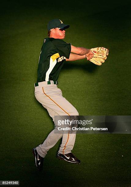 James Beresford of Team Australia warms up before the spring training game against the Seattle Mariners at Peoria Stadium on March 4, 2009 in Peoria,...