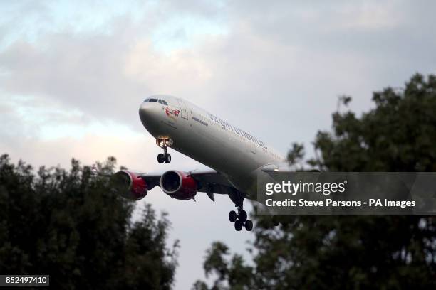 Virgin Atlantic Airbus A340-600 plane lands at Heathrow Airport PRESS ASSOCIATION Photo. Picture date: Sunday October 13, 2013. See PA story . Photo...
