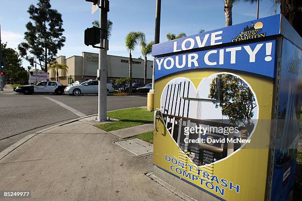 Los Angeles County Sheriff's deputies pass an electrical box painted to encourage community pride, March 3, 2009 in Compton, California. The city...