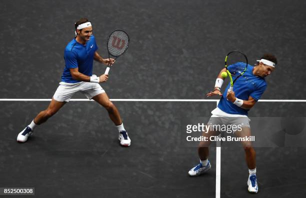 Roger Federer and Rafael Nadal of Team Europe in action during there doubles match against Jack Sock and Sam Querrey of Team World on Day 2 of the...