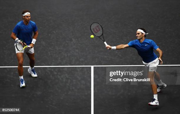 Roger Federer and Rafael Nadal of Team Europe in action during there doubles match against Jack Sock and Sam Querrey of Team World on Day 2 of the...