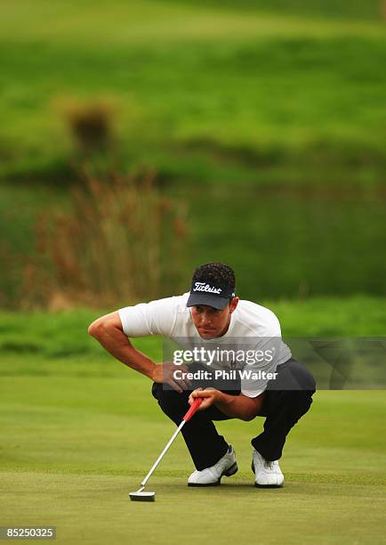 Gareth Paddison of New Zealand lines up his putt on the 9th hole during day one of the New Zealand PGA Championship held at the Clearwater Golf Club...