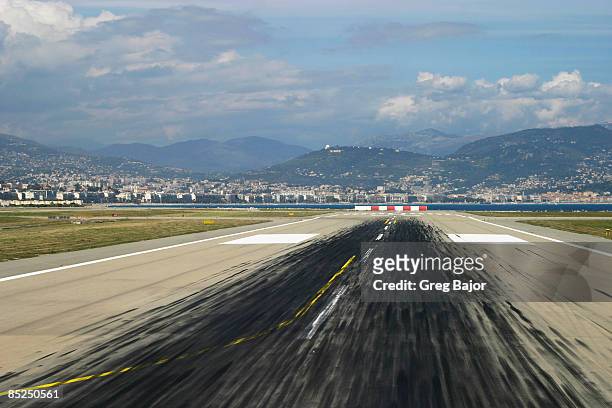 skid marks on the runway - greg bajor stock-fotos und bilder