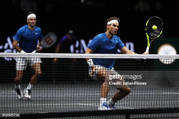 Roger Federer and Rafael Nadal of Team Europe in action during there doubles match against Jack Sock and Sam Querrey of Team World on Day 2 of the...