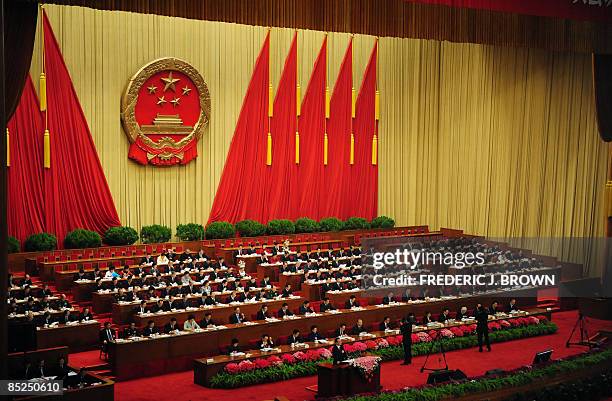 Chinese Premier Wen Jiabao delivers his opening speech as top leaders of China's ruling Communist party attend for the opening session of the...