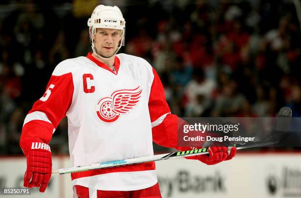 Captain Nicklas Lidstrom of the Detroit Red Wings awaits action as he leads his team against the Colorado Avalanche at the Pepsi Center on March 4,...