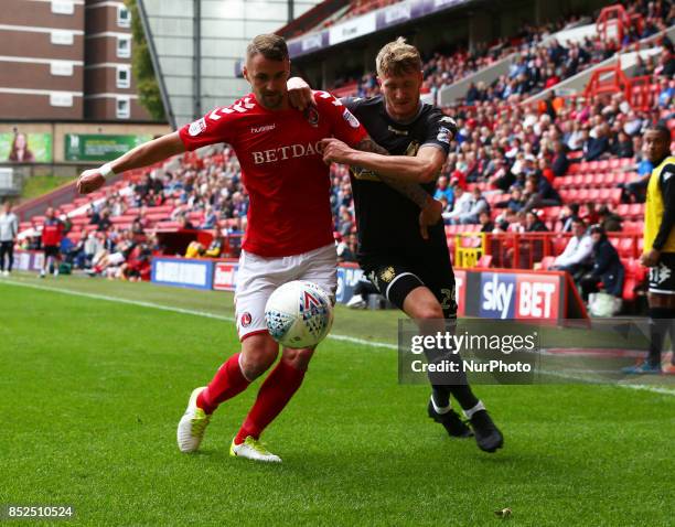 Charlton Athletic's Patrick Bauer holds of Michael Smith of Bury during Sky Bet League One match between Charlton Athletic against Bury at The Valley...