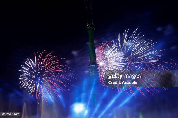 Fireworks go off by the Ostankino TV Tower during the opening of the 2017 Circle of Light International Festival in Moscow, Russia on September 23,...