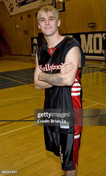 Pop singer Aaron Carter poses at The Hollywood Knights celebrity basketball game at El Monte High School on March 4, 2009 in El Monte, California.