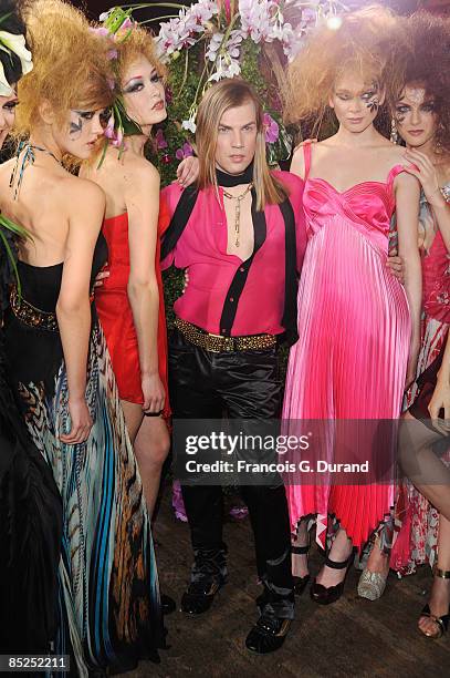 Designer Christophe Guillarme poses with his models after the Christophe Guillarme Ready-to-Wear A/W 2009 fashion show during Paris Fashion Week on...