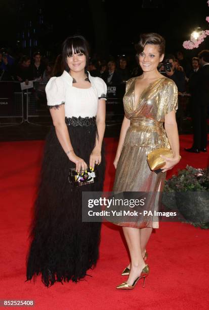 Lily Allen and Sarah Owen at the gala screening of Saving Mr Banks, the closing film of the 57th BFI London Film Festival at Odeon Leicester Square,...