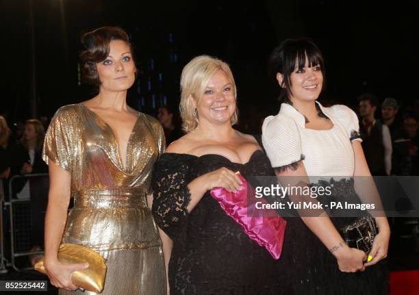 Left to right. Sarah Owen, Alison Owen and Lily Allen at the gala screening of Saving Mr Banks, the closing film of the 57th BFI London Film Festival...