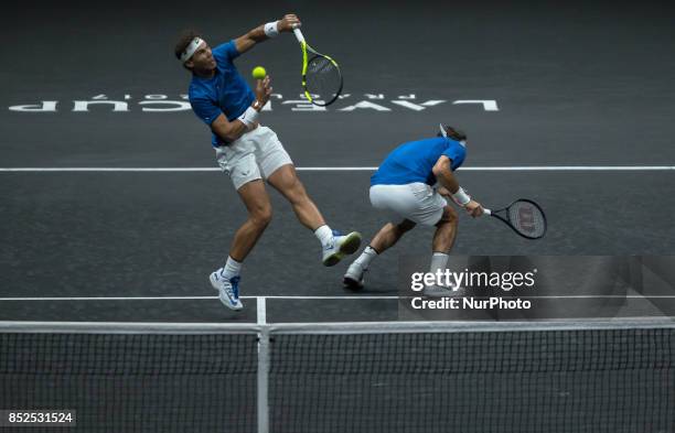 Team Europe players Rafael Nadal and Roger Federer plays against Team World players Sam Querrey and Jack Sock during the second day at Laver Cup on...