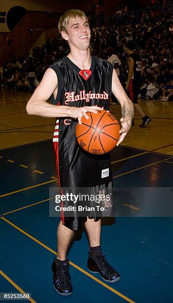 Pop singer Aaron Carter plays basketball at The Hollywood Knights Celebrity Basketball Game at El Monte High School on March 4, 2009 in El Monte,...