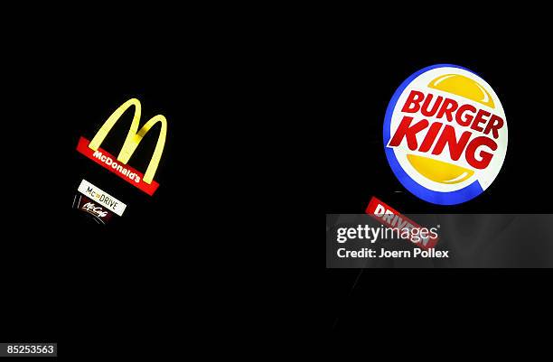 The signs of the fast food companies Burger King and McDonald's are seen side by side on March 5, 2009 in Bad Fallingbostel, Germany. Fast food...