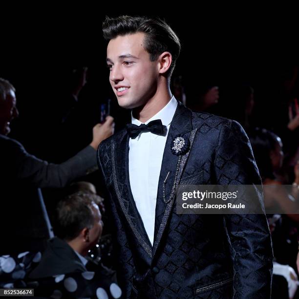 Cameron Dallas walks the runway at the Dolce & Gabbana secret show during Milan Fashion Week Spring/Summer 2018 at Bar Martini on September 23, 2017...