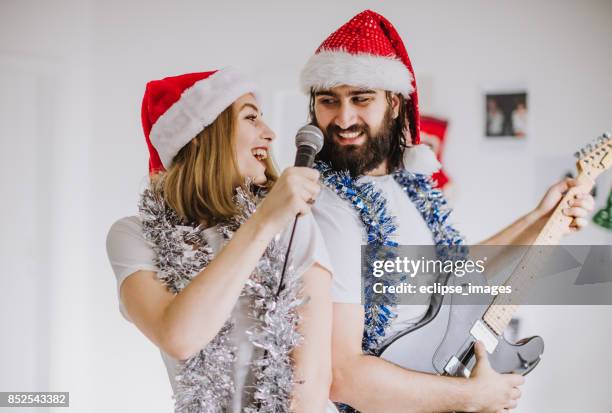 we love that song - christmas singing stock pictures, royalty-free photos & images