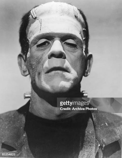 English actor Boris Karloff in full make-up for his role as The Monster in James Whale's horror films 'Frankenstein' and 'Bride of Frankenstein',...