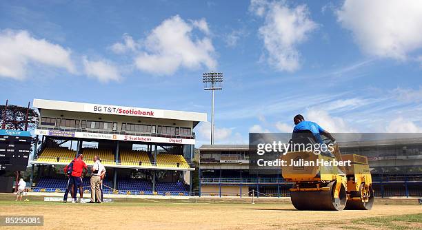 Groundsmen prepare the wicket at The Queen's Park Oval on March 5, 2009 in Port-of-Spain, Trinidad. The ground hosts The 5th Test between The West...