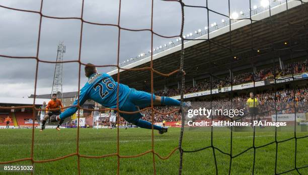 Dundee United's Nadir Ciftci scores from the penalty spot during the Scottish Premier League match at Tannadice Park, Dundee.