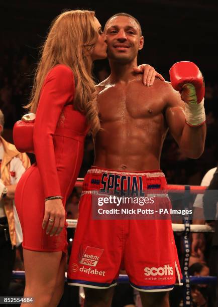 Great Britain's Kell Brook gets a kiss from his girlfriend Lindsey after defeating Ukraine's Vyacheslav Senchenko in their IBF World Welterweight...