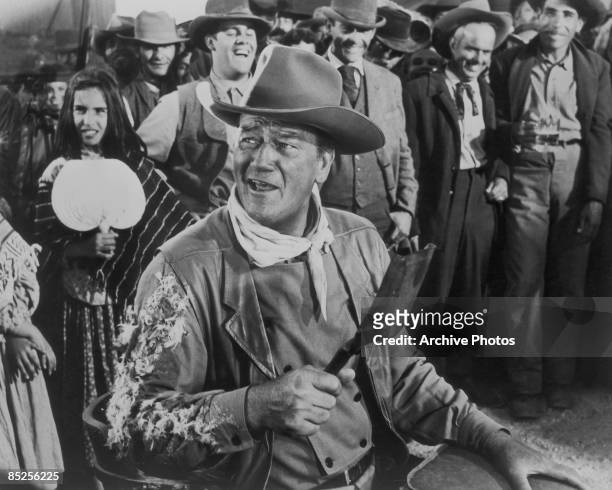 American actor John Wayne plays the lead character in the film 'McLintock!', 1963.