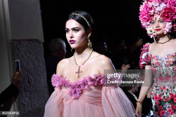 Amelia Hamlin walks the runway at the Dolce & Gabbana secret show during Milan Fashion Week Spring/Summer 2018 at Bar Martini on September 23, 2017...