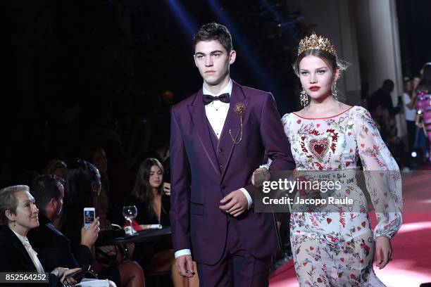 Hero Fiennes Tiffin and Laura Murray walk the runway at the Dolce & Gabbana secret show during Milan Fashion Week Spring/Summer 2018 at Bar Martini...