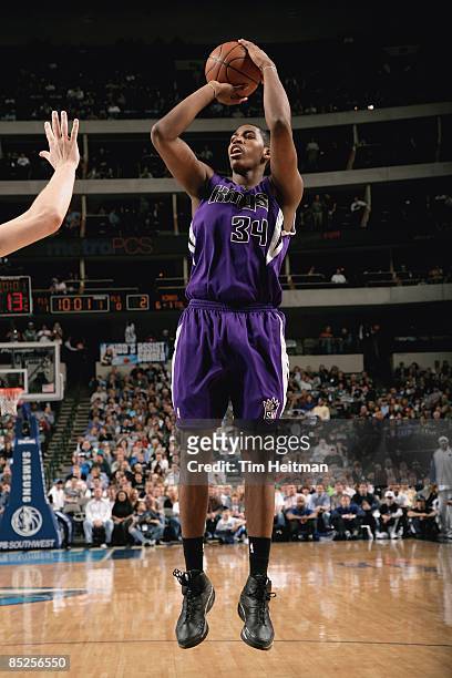 Jason Thompson of the Sacramento Kings shoots a jumper during the game against the Dallas Mavericks on February 10, 2009 at American Airlines Center...