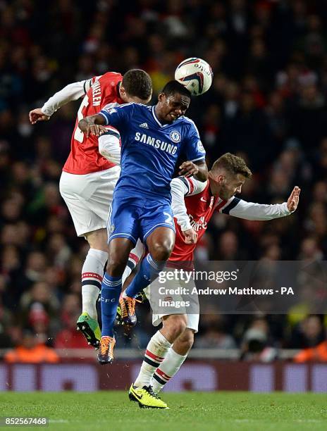 Chelsea's Samuel Eto'o battles for the ball with Arsenal's Thomas Vermaelen and Jack Wilshere