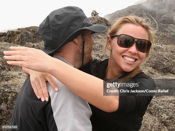 Gary Barlow and Kimberley Walsh embrace on the fifth day of The BT Red Nose Climb of Kilimanjaro on March 5, 2009 near Arusha, Tanzania. Celebrities...