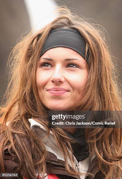 Cheryl Cole smiles as she takes a break from trekking on the fifth day of The BT Red Nose Climb of Kilimanjaro on March 5, 2009 near Arusha,...