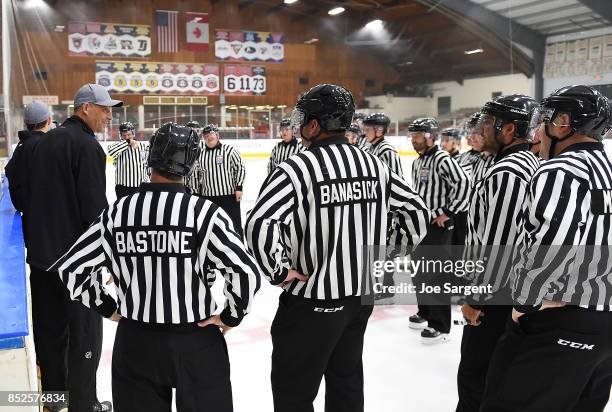 Linesman Derek Amell talks with participants of a referee clinic during Day 3 of NHL Kraft Hockeyville USA at Rostraver Ice Gardens on September 23,...